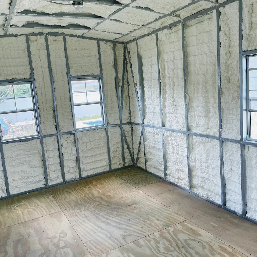 Closed-cell spray foam insulation applied to wall cavities in a residential project in Kirkland